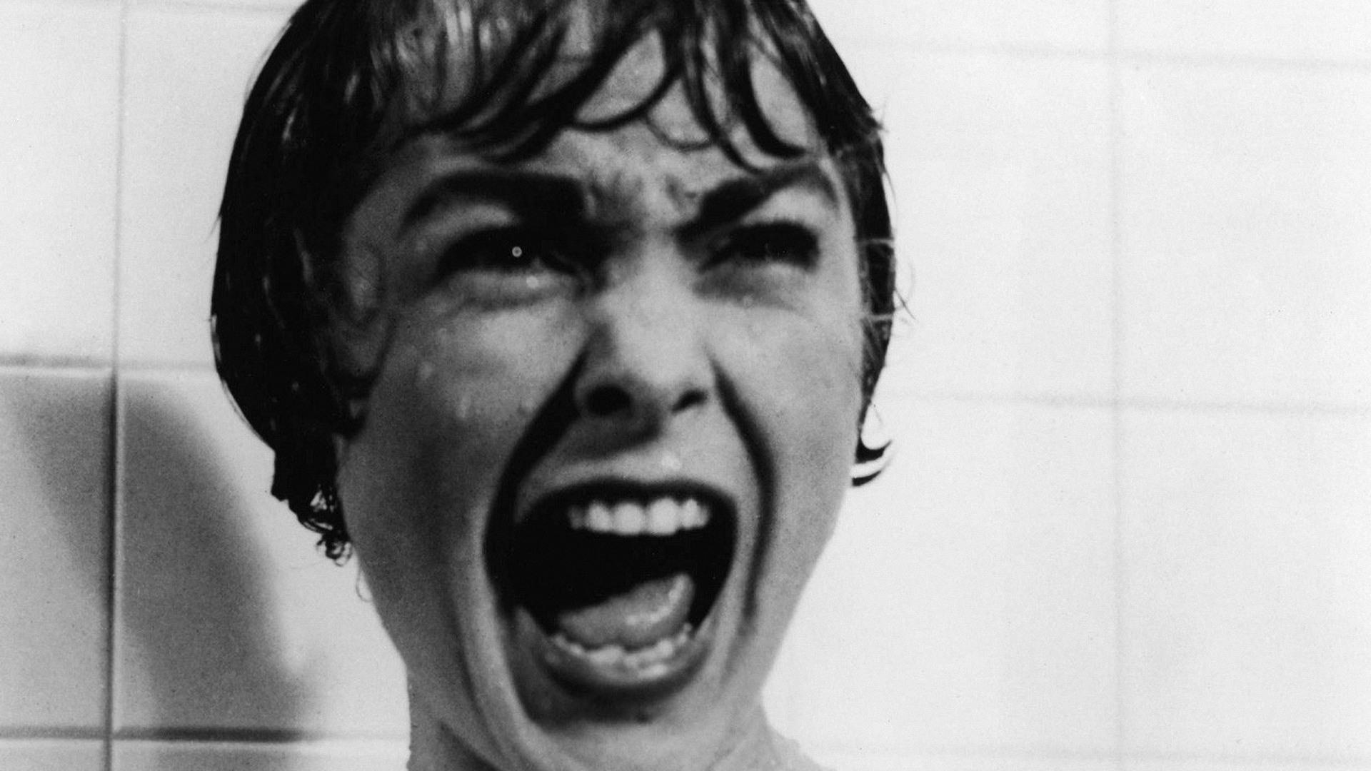 Marion Crane screaming in terror in the 1960s Hitchcock film Psycho